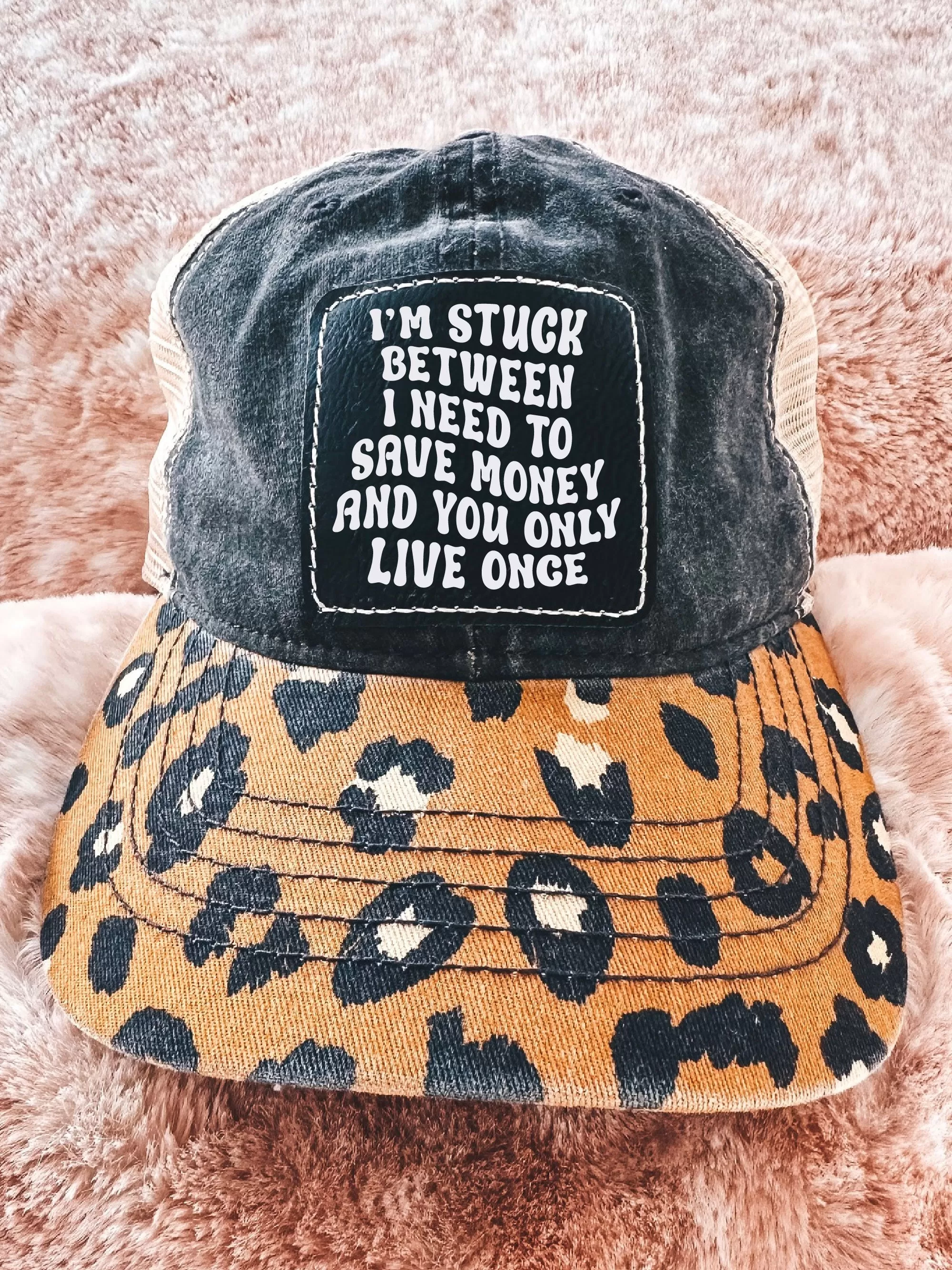 I'm Stuck Between I Need To Save Money And You Only Live Once (Leopard Hat)