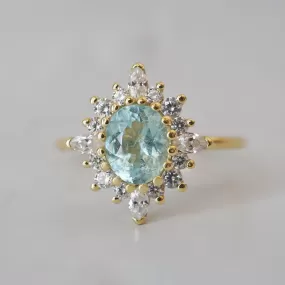 One Of A Kind: Oval Paraiba Tourmaline Mirage Diamond Ring in 14K and 18K Gold