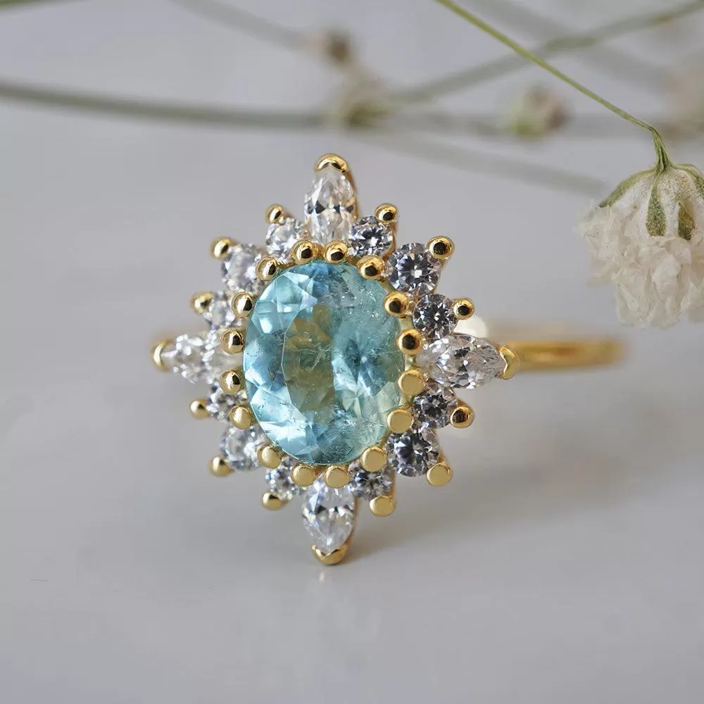 One Of A Kind: Oval Paraiba Tourmaline Mirage Diamond Ring in 14K and 18K Gold